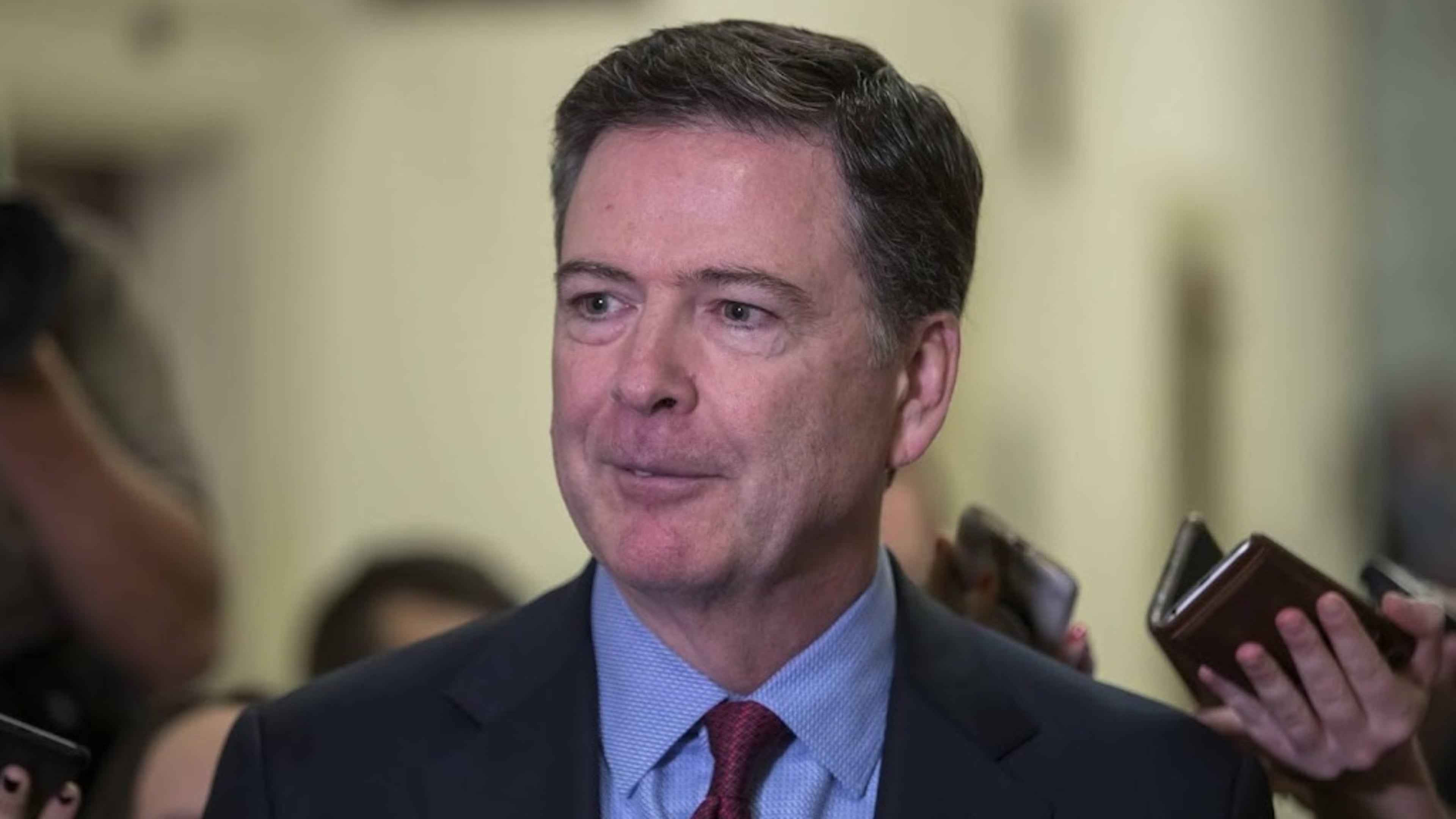 Former FBI Director Comey charged with threatening president