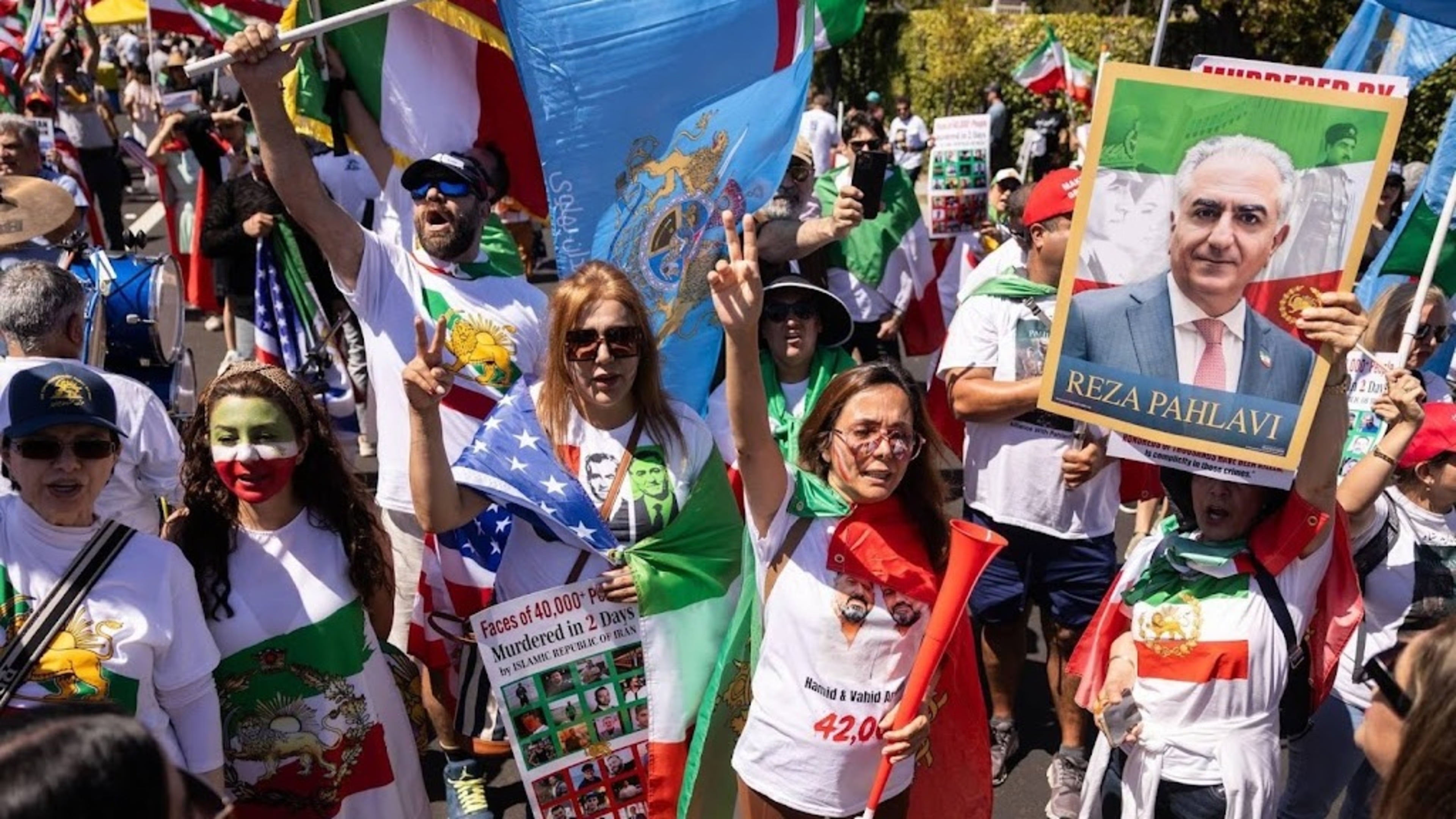 Hundreds of protesters at World Cup stadium where Iran plays