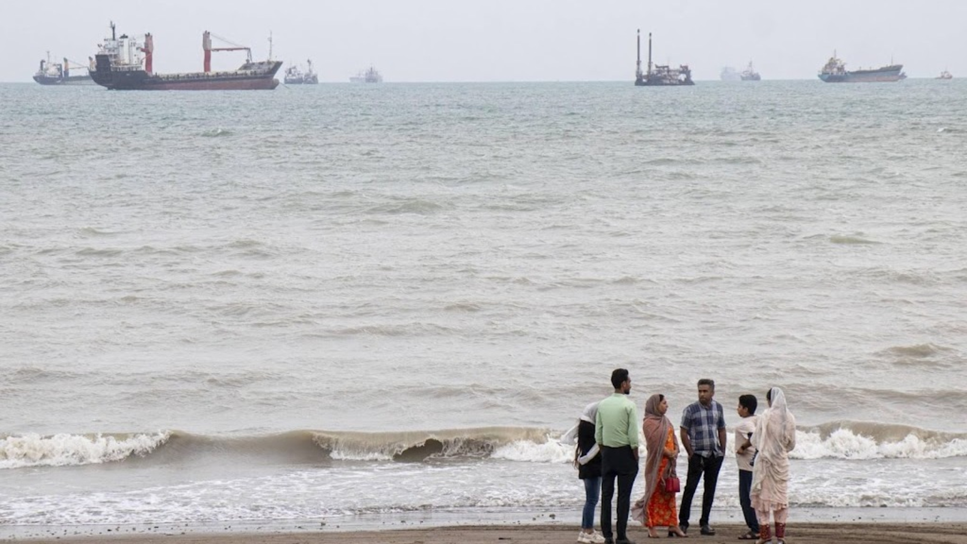 Iranian state media report explosions near Strait of Hormuz