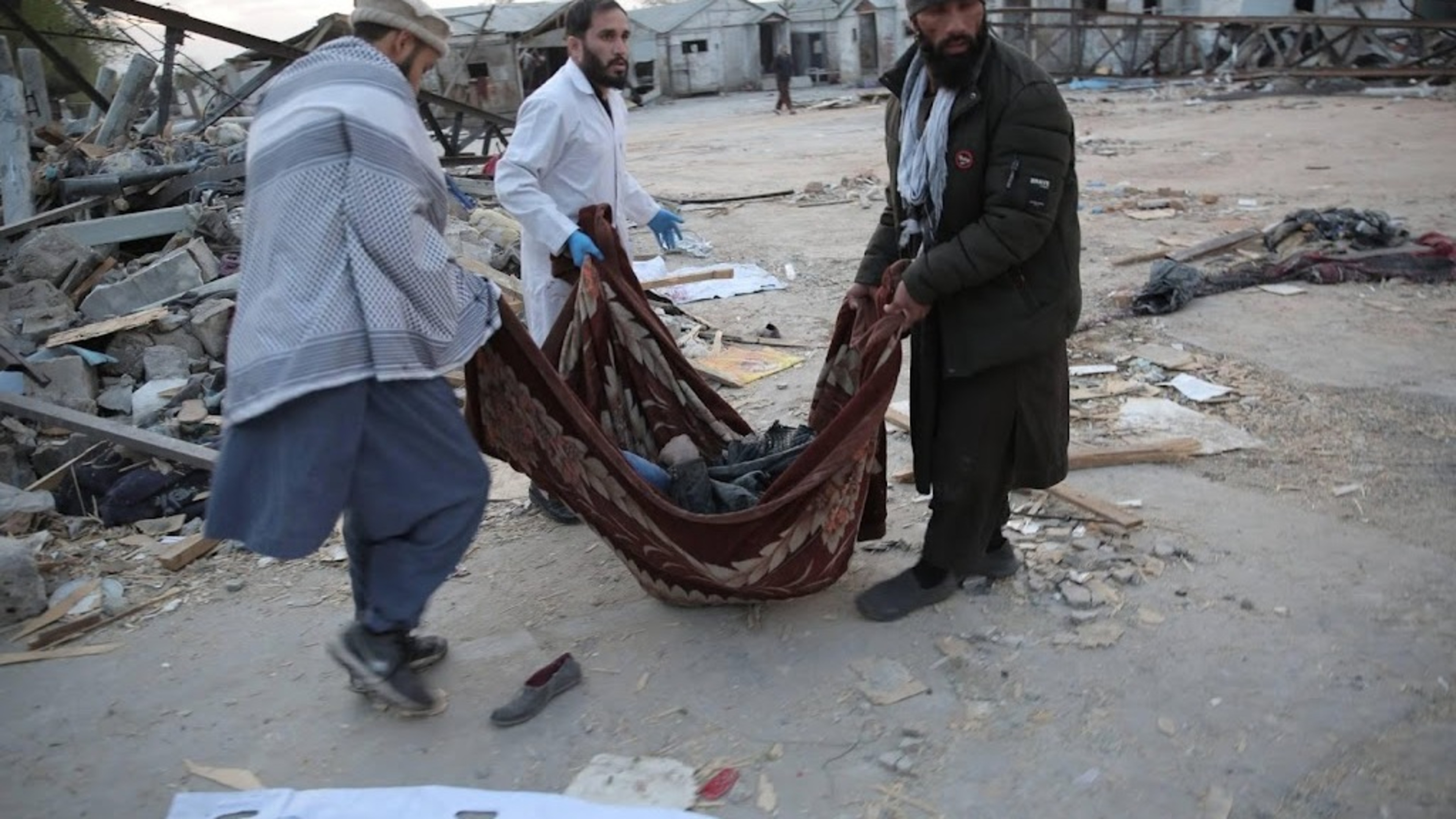Dozens of bodies recovered from rubble of hit Kabul hospital