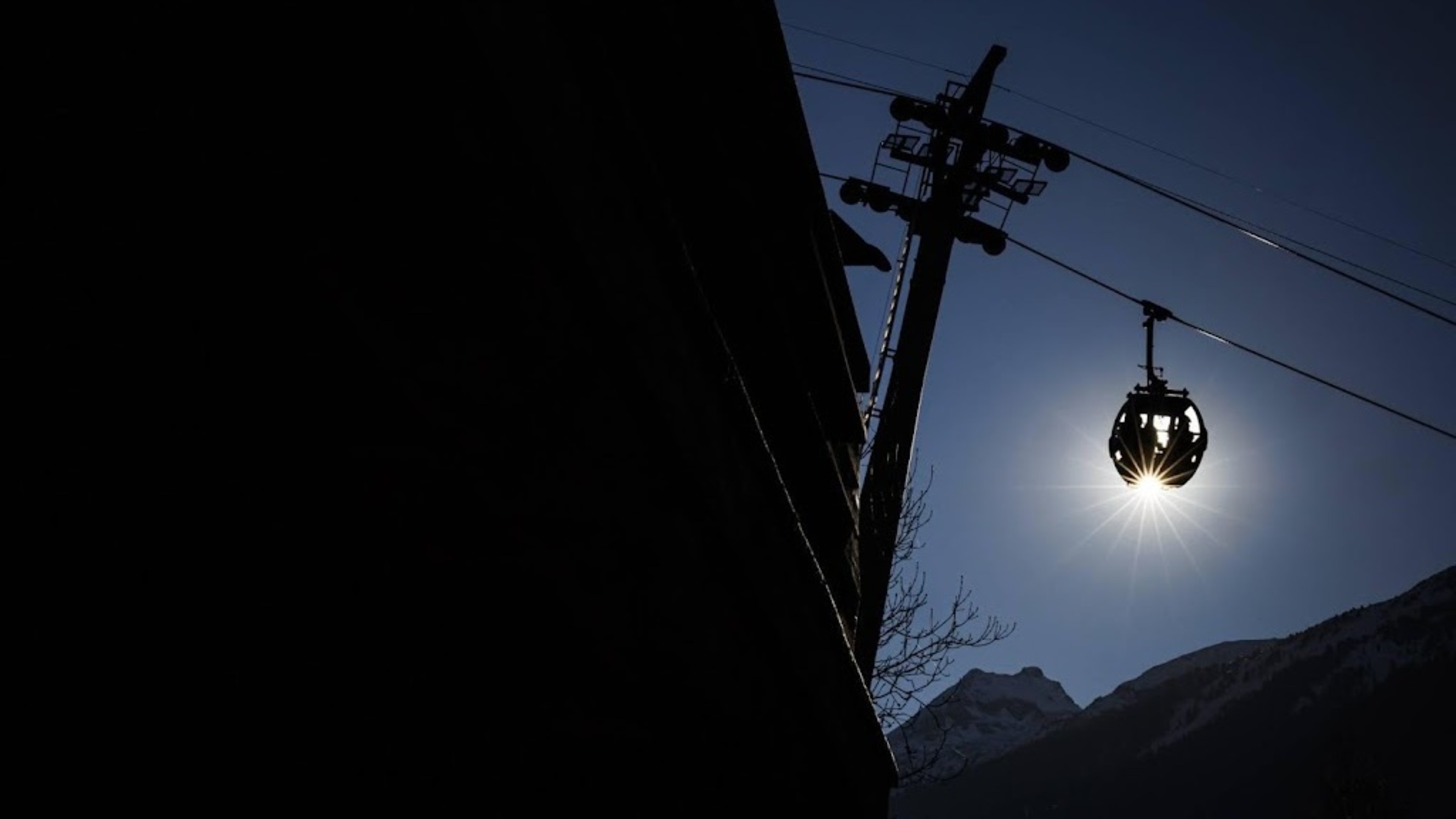 Ski gondola detaches in Swiss resort and rolls down mountain