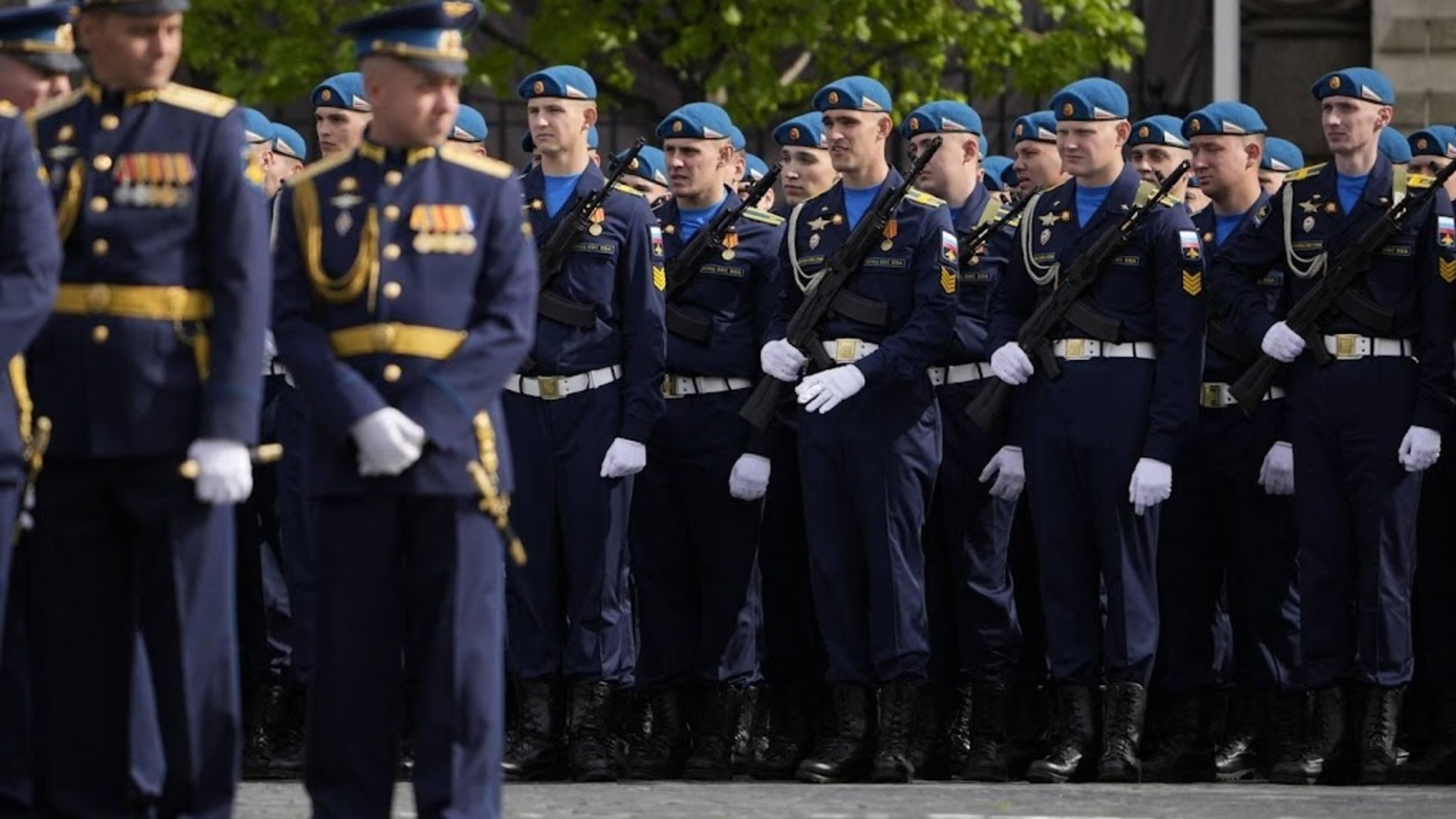 Russia holds stripped-down military parade, no heavy equipment