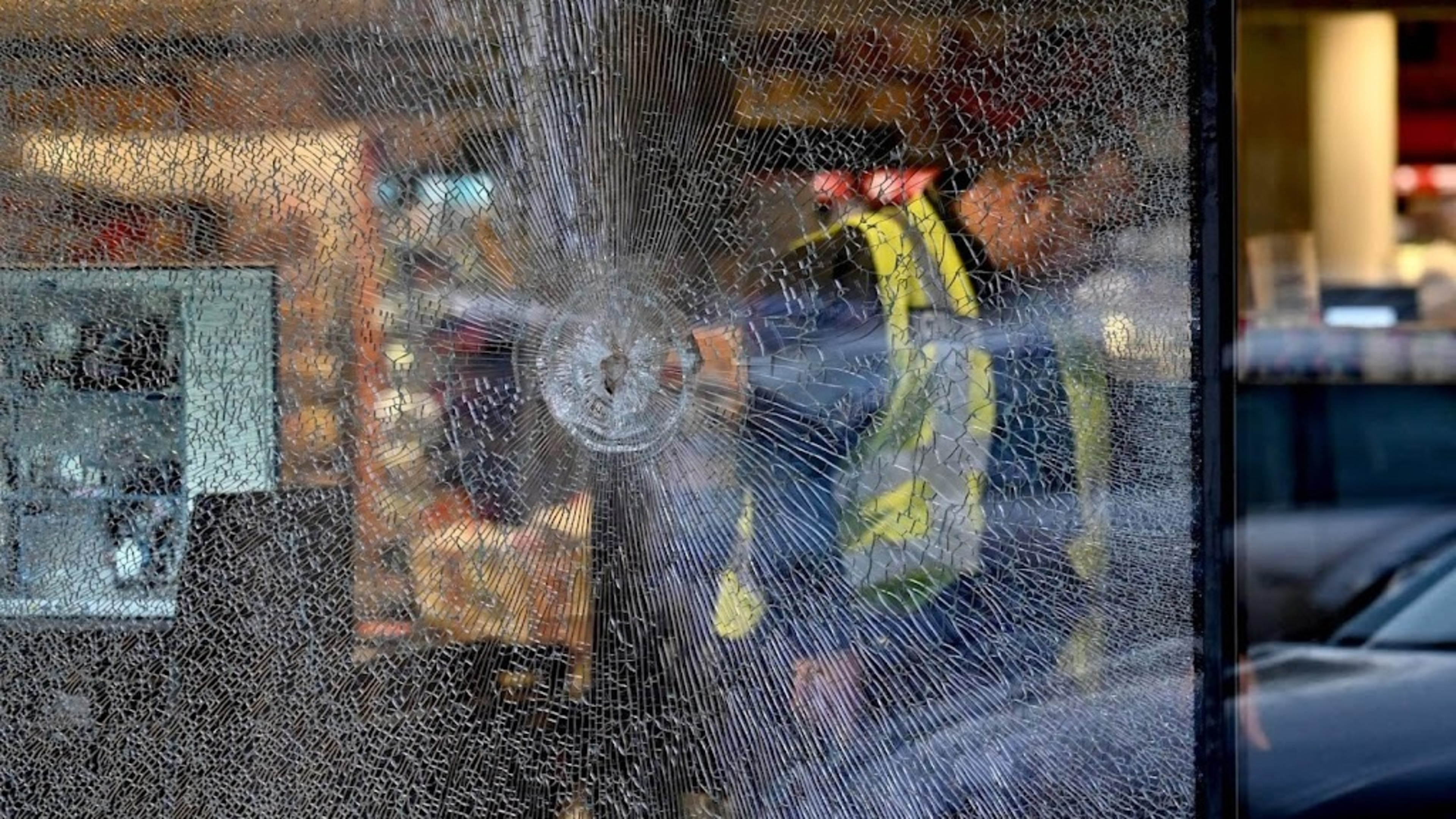 Two officers suspended for fleeing during shooting in Kyiv