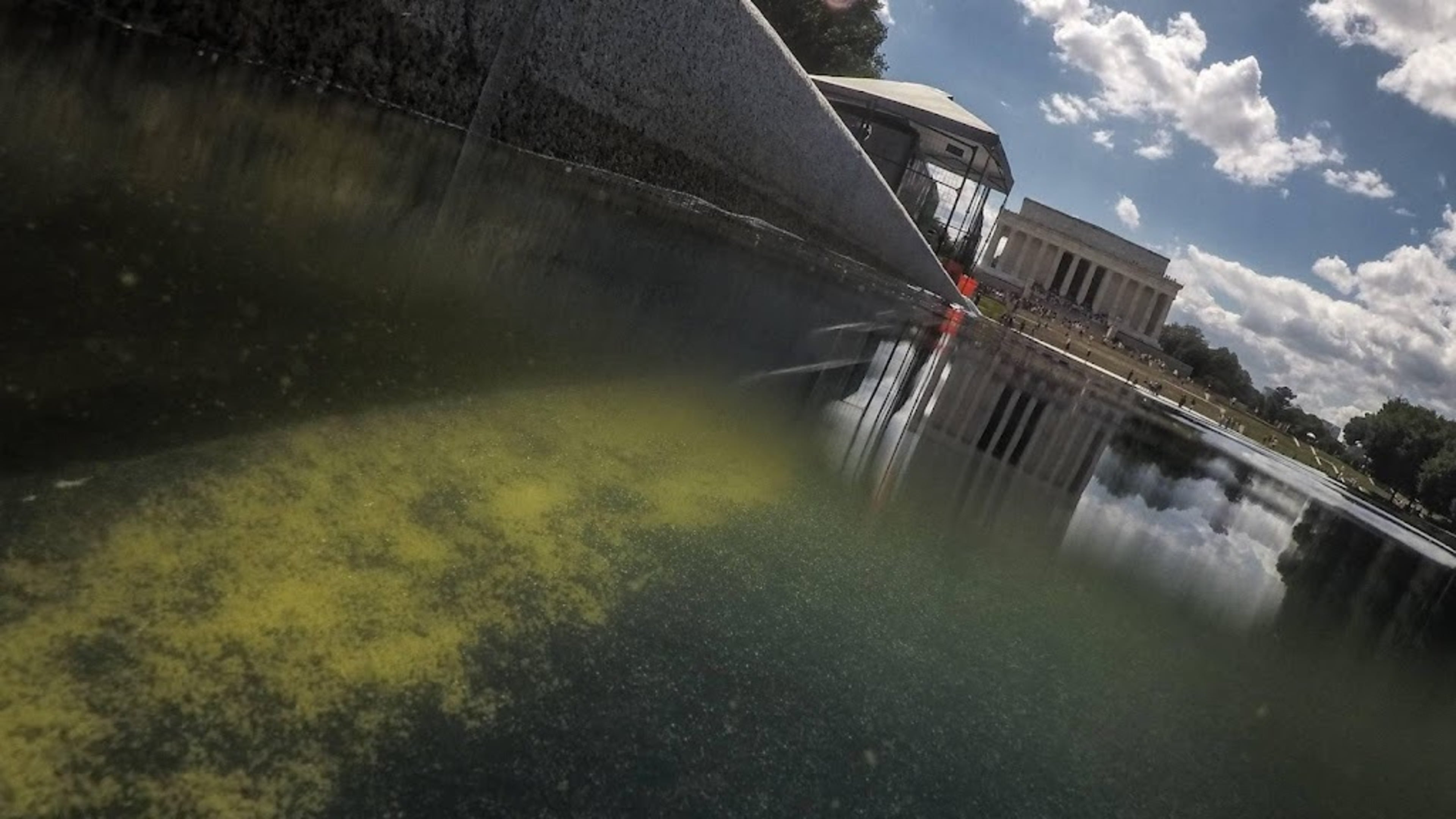 Paint peeling from Reflecting Pool, Trump blames vandals