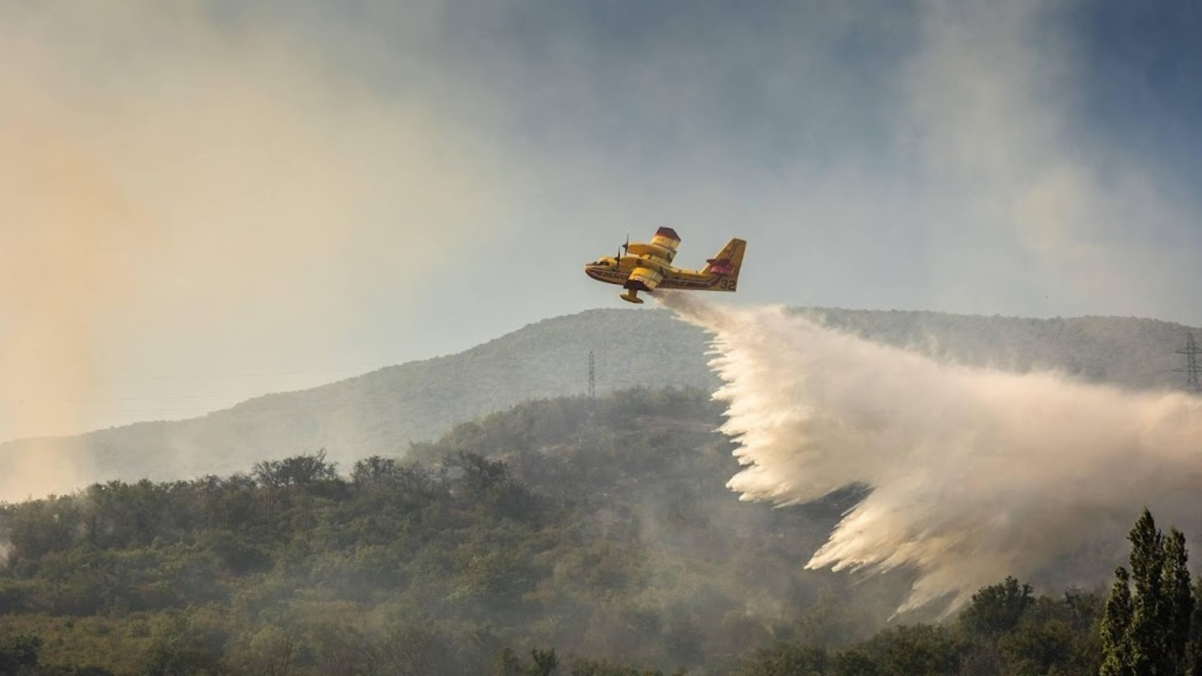 Macron expresses solidarity with wildfire victims