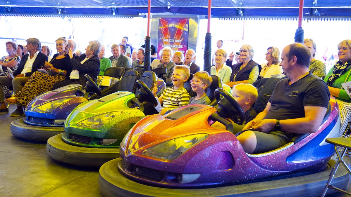 Unconventional Priest Ends Service Between Bumper Automobiles at Feast in Lorne